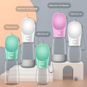 Portable water cups in various sizes and colors including pink, green, and gray for pets.